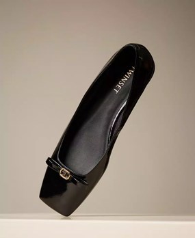 Faux patent leather ballet flats with bow