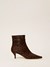 Leather ankle boots with animal print