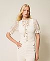 Knit waistcoat with crochet detail