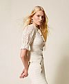 Knit waistcoat with crochet detail