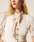 Knit waistcoat with crochet detail