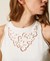 Top with inlaid embroidery