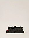 Raffia clutch with charm