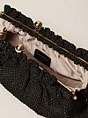 Raffia clutch with charm