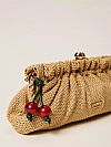 Raffia clutch with charm